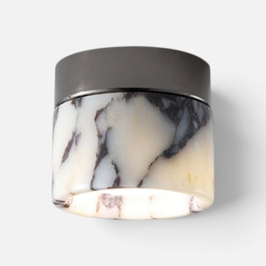 Elvora marble cylinder ceiling spotlight with unique black and white veining and a sleek metal top plate